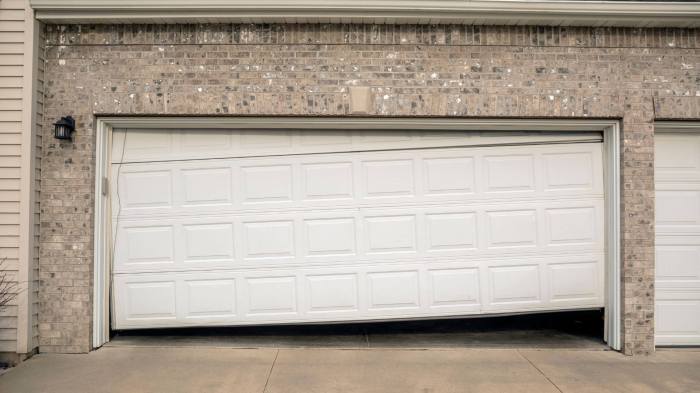 Garage door spring broken how to open