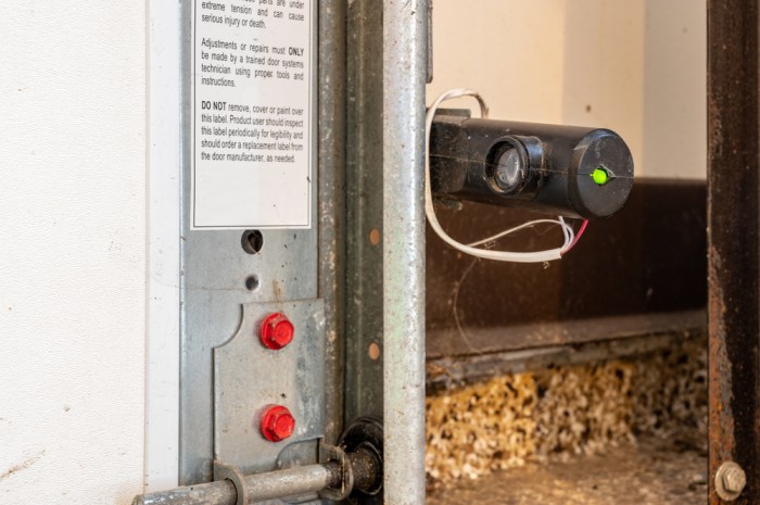 How do garage door sensors work