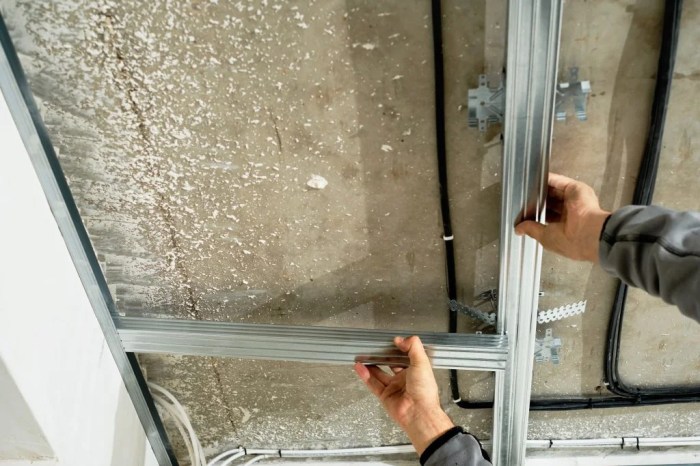 How to replace caulking around garage door frame